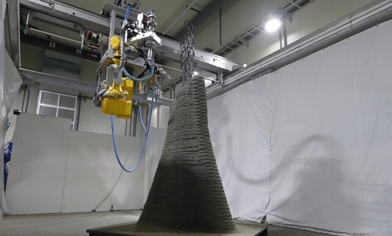 Shimizu Corporation develops spray-based 3D concrete printing - integrating a gantry robot with a material spray simulator.